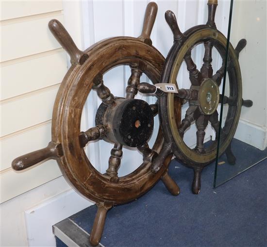 A 19th century brass mounted ships wheel and a 20th century ships wheel